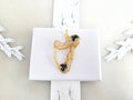 Handcrafted translucent green resin Irish harp necklace with preserved real clover leaves inside a gold-plated frame, featuring a celtic wire wrapped pendant design
